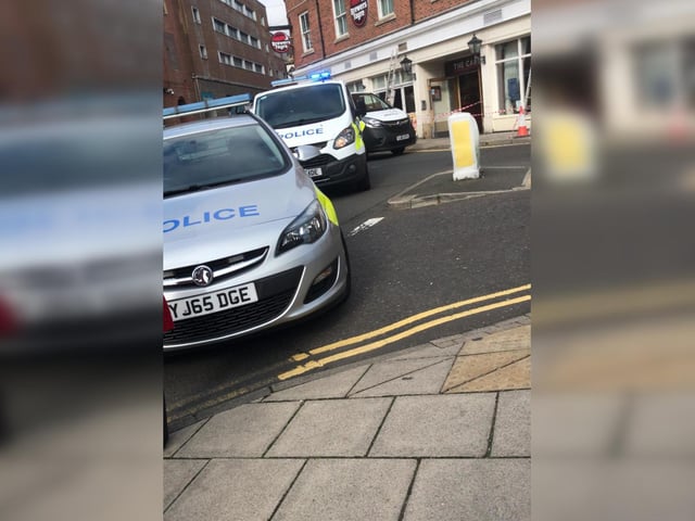 The scene outside the Palm Court Hotel