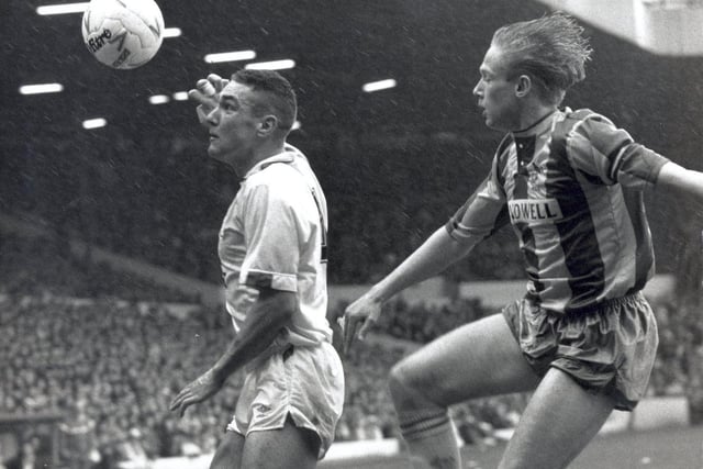 Vinnie Jones shows a delicate touch and keen concentration on this header despite close attention from West Bromwich Albion's Stacey North during the Division Two clash at Elland Road in February 1990.