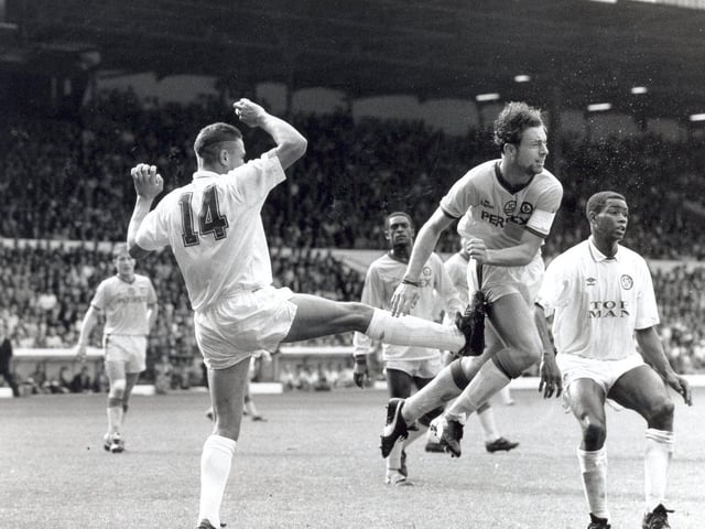 Blackburn Rovers captain Keith Hill winces as Vinnie Jones's right boot makes contact with his thigh during tjhe Division Two clash at Elland Road in August 1989. The game finished 1-1.