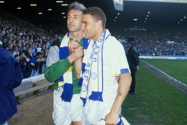 Vinnie Jones celebrates with goalkeeper Mervyn Day and the faithful after a promotion friendly against Genoa.
