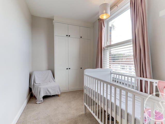 Another one of the first floor bedrooms, currently used as a nursery.