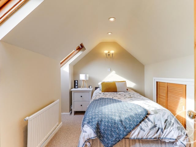 There is one further bedroom on the second floor which benefits from two Velux windows and under eaves storage space. It also has its own luxury shower room.
