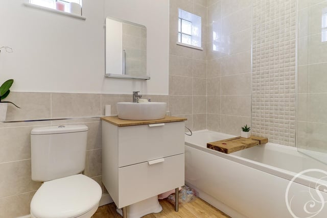 In total, there are three bathrooms in the property with one on each floor of the house.