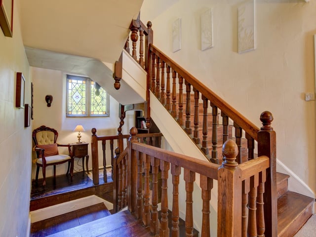 Landings, windows, and stairs are all part of the character of the Hall.
