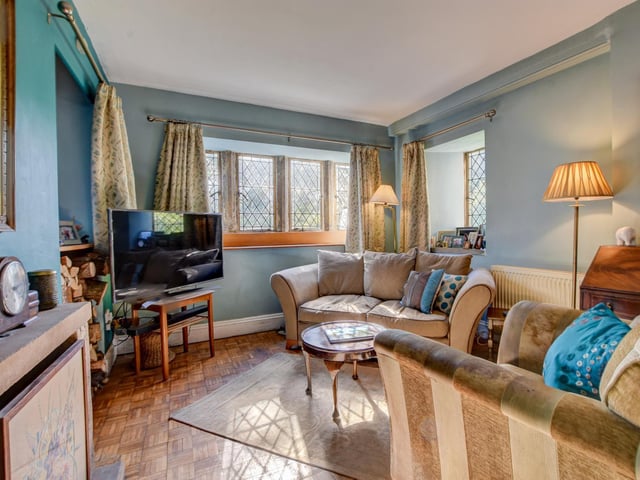 A light, bright and cosy sitting room within the property