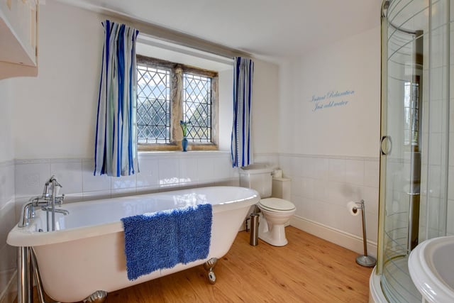 Baths with claw feet look fitting within this period home.