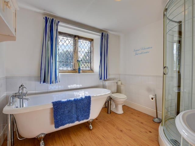 Baths with claw feet look fitting within this period home.
