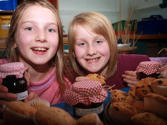 Pupils Mollie Forsyth and Alex Lloyd at Glaisdale School's harvest festival.