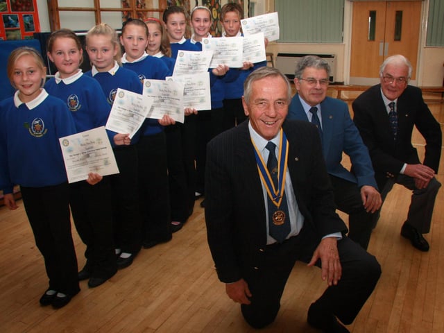 Children from Stakesby School are awarded their certificates for designing a new swing bridge.