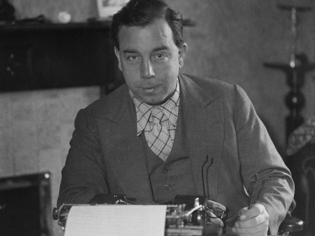 English playwright and novelist, J. B. Priestley at his typewriter during a visit to Bradford in October 1933.