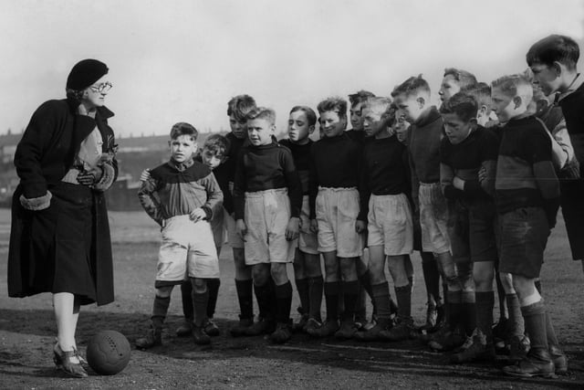 Schoolteacher Miss B Casey is pictured coaching members of the St Williams' School team at Girlington in November 1938.