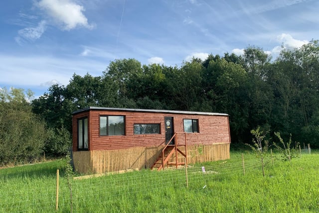 This is the stunning home created by a young couple - using an old lorry trailer.