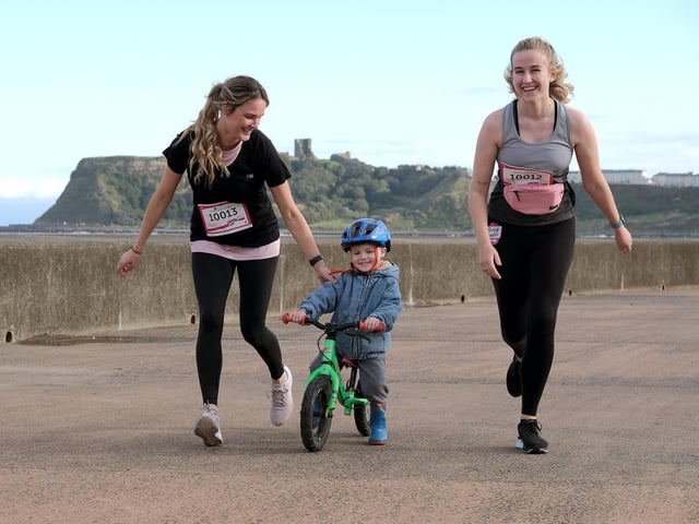 Emily Turner warms up with son Jonah and his auntie Angel Turner.