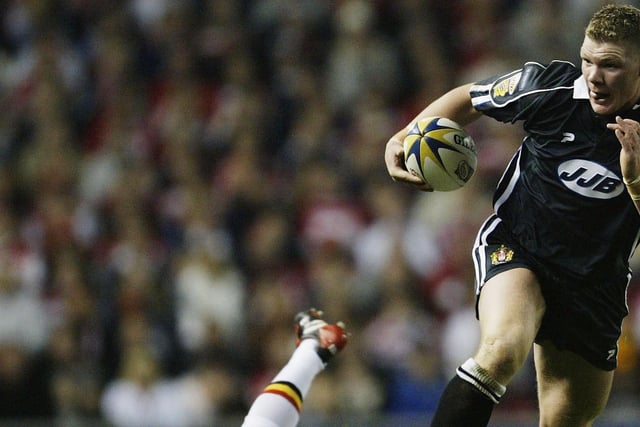 2003 - Danny Tickle of Wigan goes through to score the first try during the Super League Grand Final match between Bradford Bulls and Wigan Warriors at Old Trafford on October 18, 2003 in Manchester, England.