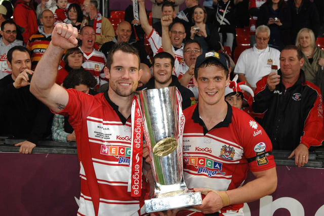2010 - Super League Grand Final, Wigan Warriors v St Helens:   Pat Richards, showing off his Super League winners ring with Sean O'Loughlin with the trophy