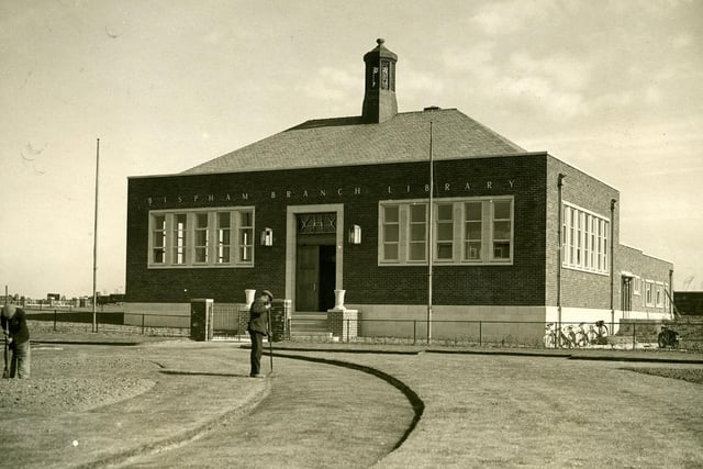 Council groundsmen put the finishing touches to the gardens at the new Bispham Library, 1938