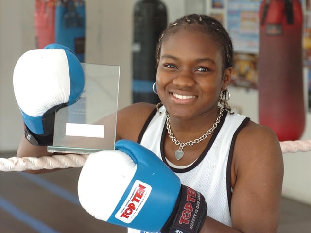 Boxer Nicola Adams is pictured with her third ABA trophy in June 2006.