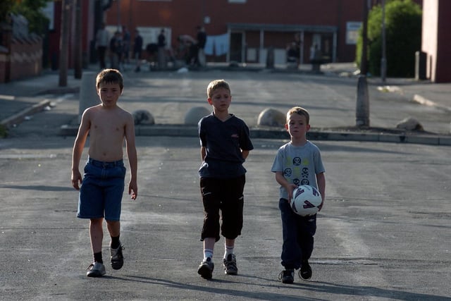 Kids play football at East End Park in June 2006.