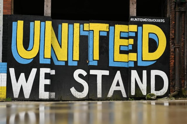 Inspired by the role and importance of football, Jiem Washere created murals emblazoning the city’s walls with and well known messages “Marching On Together” and ‘United We Stand’.