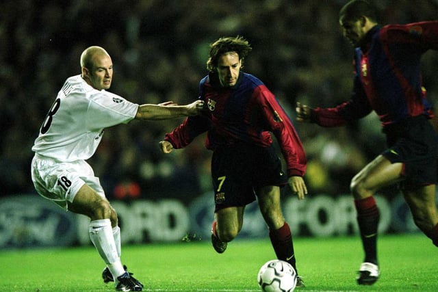 Danny Mills clashes with Barcelona's Alfonso.