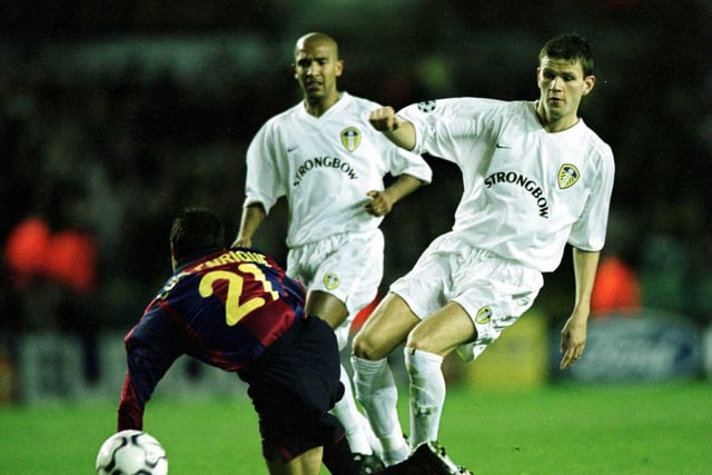 Eirik Bakke threads the ball through despite the attentions of Barcelona's Luis Enrique.