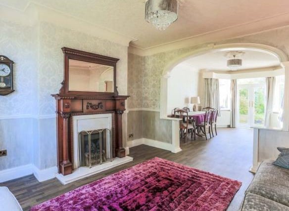 From the hall you can access the light-filled living room, with beautiful curved bay window overlooking the front garden. The lounge benefits from am ornate wooded mantle piece, fireplace and a gas fire.