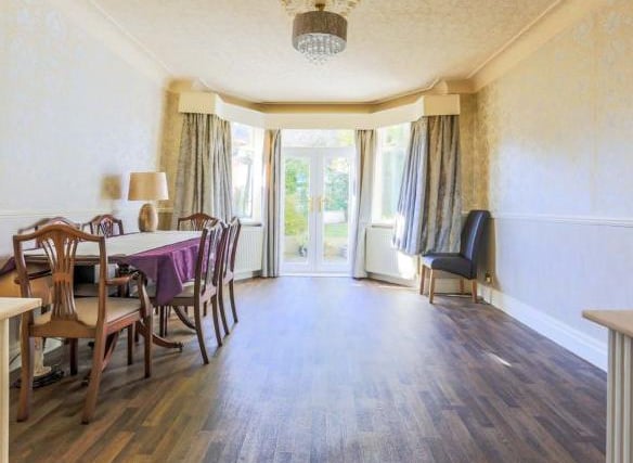 The dining room is a room with plenty of space for entertaining and family meals. It benefits from double doors leading out into the garden and could be transformed into another living space.