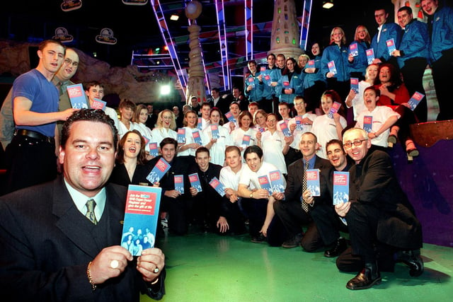 Fred Booth (left) general manager of Barcelona nightclub with his staff who are handing out donor cards.