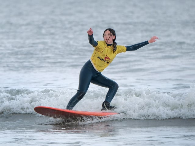 Balancing on the board.