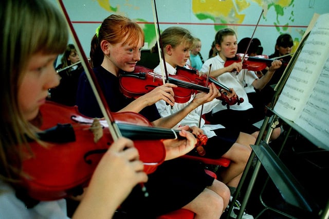Four members of the orchestra at Ninelands Lane Primary School. Pictured, from left, are Kirsty Winter, Lisa Llewellyn, Laura Pritchard and Eleanor Leatham.