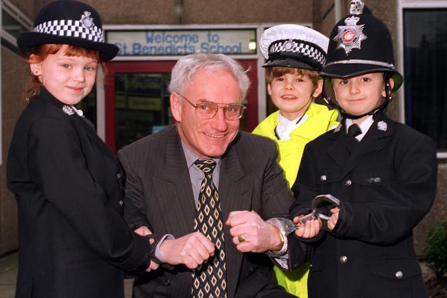 Joe McNally, headteacher at St Benedict's in Garforth, is arrested by pupils Katie Booker, Jake Ramsden and Andrew Walker in January 1997.