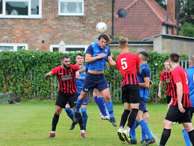 Tommy Wilson wins a header

Photo by Alec Coulson