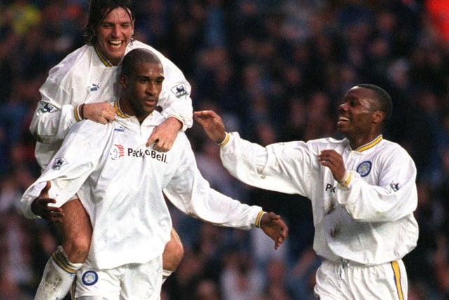 Lee Sharpe and Rod Wallace congratulate Brian Deane after he scored Leeds United's third goal during the Premiership clash against Sunderland in November 1996. Leeds won 3-0.