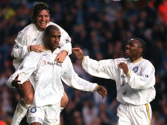 Lee Sharpe and Rod Wallace congratulate Brian Deane after he scored Leeds United's third goal during the Premiership clash against Sunderland in November 1996. Leeds won 3-0.