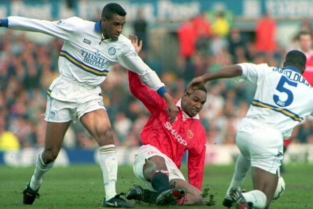 Brian Deane is tackled by Manchester United's Paul Ince during the Premier League clash at Elland Road in April 1994.