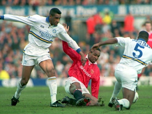 Brian Deane is tackled by Manchester United's Paul Ince during the Premier League clash at Elland Road in April 1994.