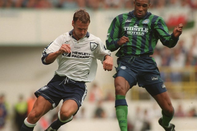 Brian Deane challenges Tottenham Hotspur's Teddy Sheringham during the Premiership clash at White Hart Lane in September 1995. Spurs won 2-1.