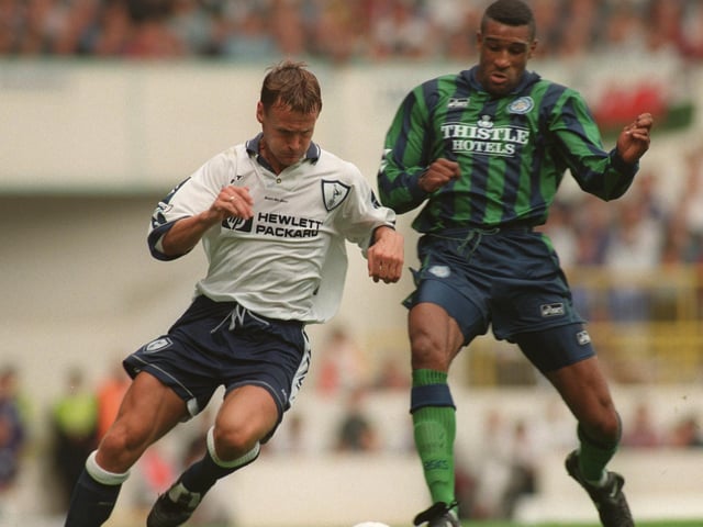 Brian Deane challenges Tottenham Hotspur's Teddy Sheringham during the Premiership clash at White Hart Lane in September 1995. Spurs won 2-1.