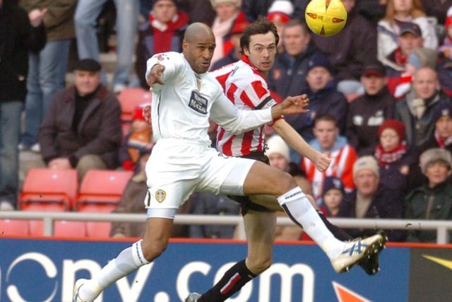 Brian Deane takes on Sunderland's Gary Breen during the Championship clash at the Stadium of Light in December 2004.