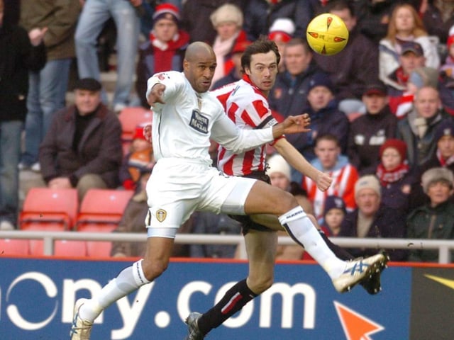 Brian Deane takes on Sunderland's Gary Breen during the Championship clash at the Stadium of Light in December 2004.