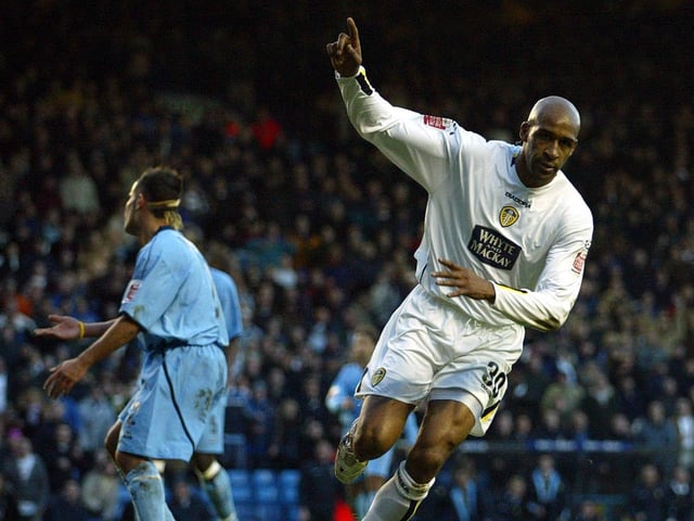 Brian Deane celebrates scoring one of his four goals during the Championship clash against Queens Park Rangers at Elland Road in November 2004. The Whites won 6-1.
