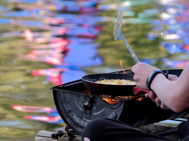 An egg being fried for the cooking part of the race.