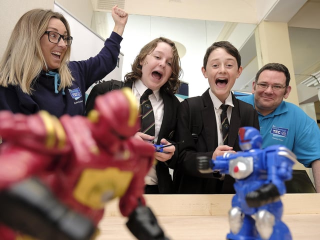 Scarborough Tec Robot wars ... staff Hayley Baker and Richard Uttley with Caedmon School pupils Alfie and Jamie..