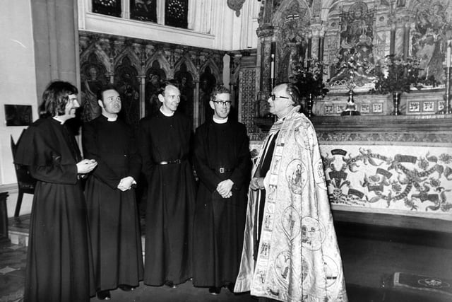 The Vicar of Leeds, Canon Fenton Morley, talks to his assistant clergy after his last service at Leeds Parish Church in June 1971. They are, from left , the Rev. Richard Wiggen, the Rev. Kenneth Yates, the Rev. John Cole and the Rev. Frank Baker, senior curate.