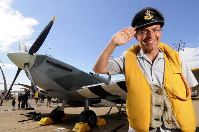 Designer Wayne Hemmingway poses by a Spitfire at the Blackpool Airshow in 2015