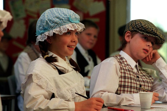 Pupils at St John the Baptist Primary School at  Adel were dressing-up in Victorian clothes as part of their Victorian history topic organised by teacher Anne Pilkington. Pictured are pupils Isabelle Mason and Kieran Tate during one of the lessons.