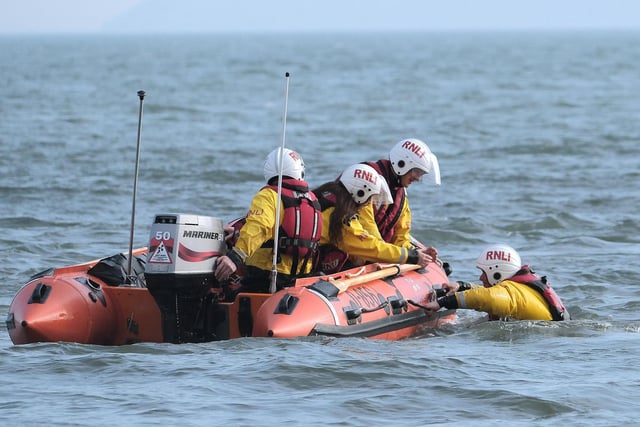 Making a rescue in South Bay as part of a demonstration.