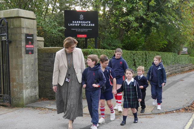 Pupils of Highfield Prep School walking to school alongside Principal of Harrogate Ladies College, Sylvia Brett