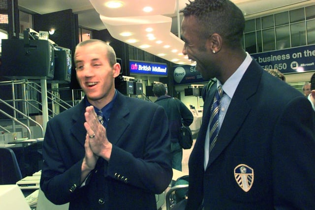 Lee Bowyer and Lucas Radebe check-in at Leeds Bradford Airport for the flight to Rome.