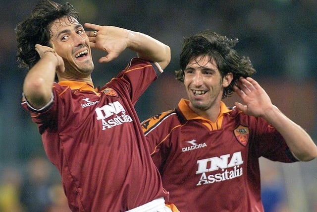 AS Roma's Marco Delvecchio (left) celebrates with teammate Alessandro Frau (right) after scoring what proved to the the winning goal of the game.